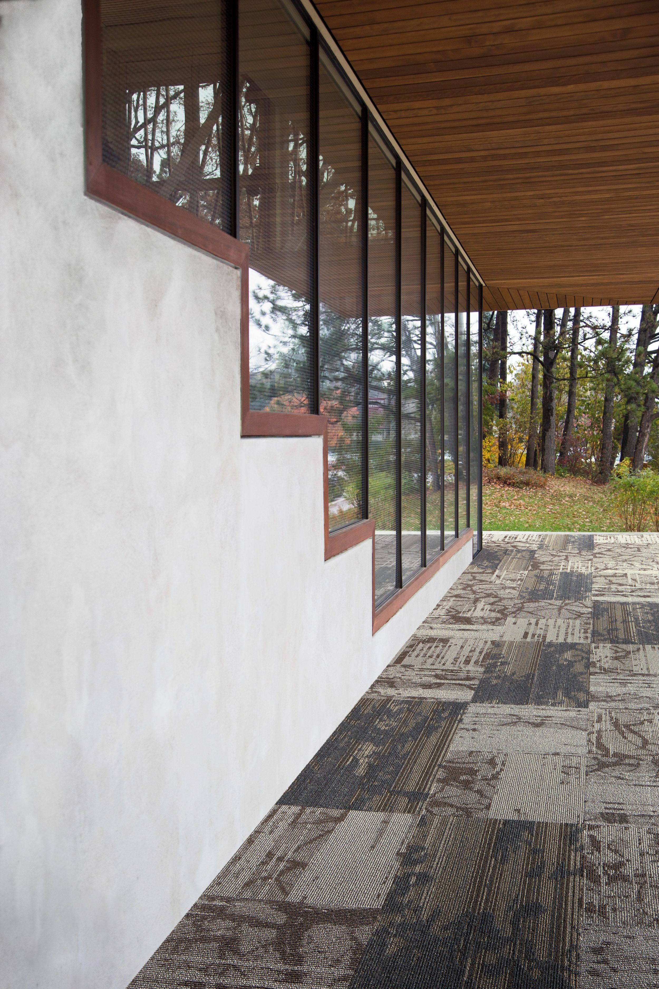 Interface Glazing and Ground plank carpet tile shown for inspiration in outdoor setting image number 10